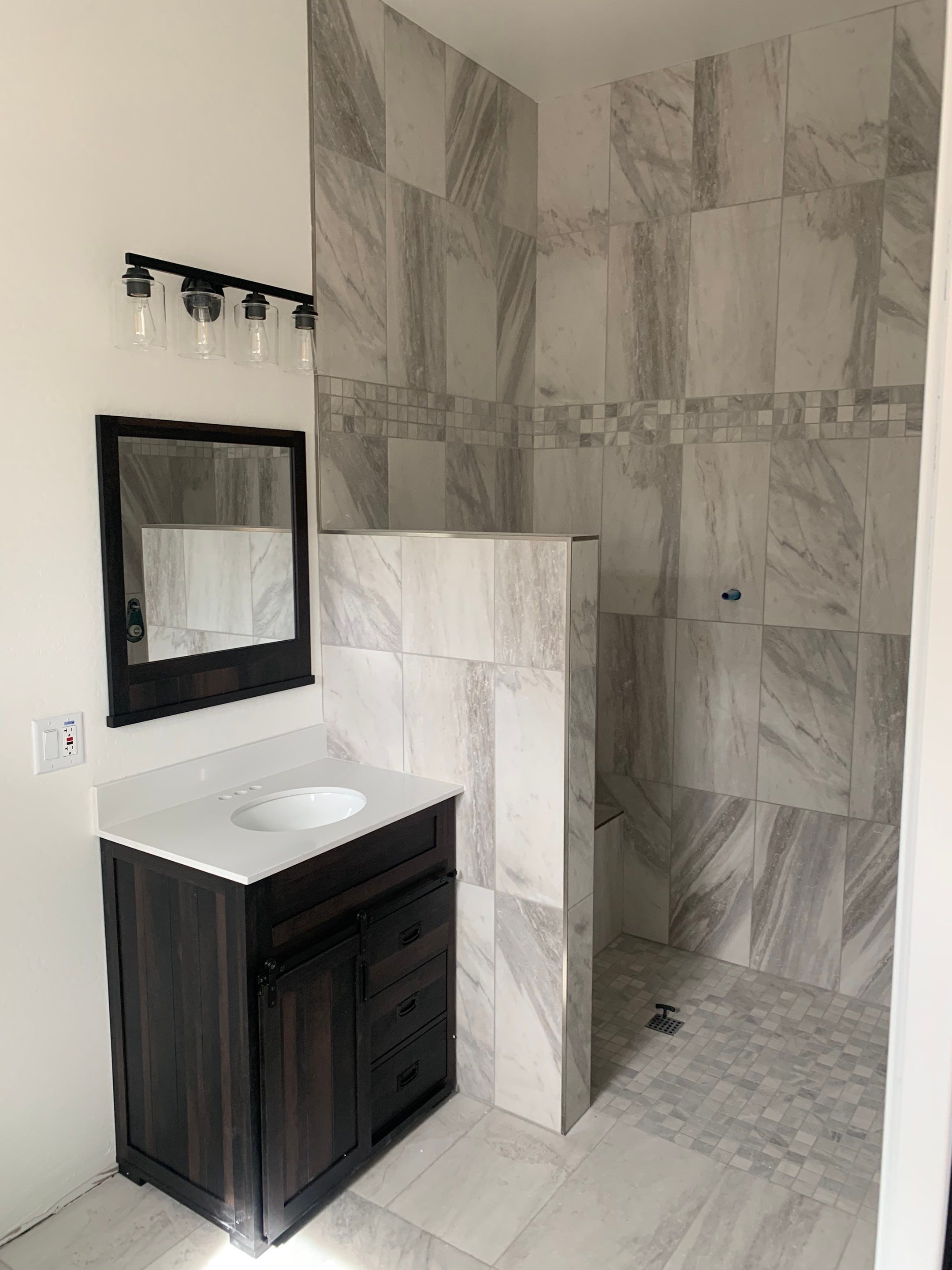 Arizona bathroom remodel with custom tiled walk-in shower by The Edge